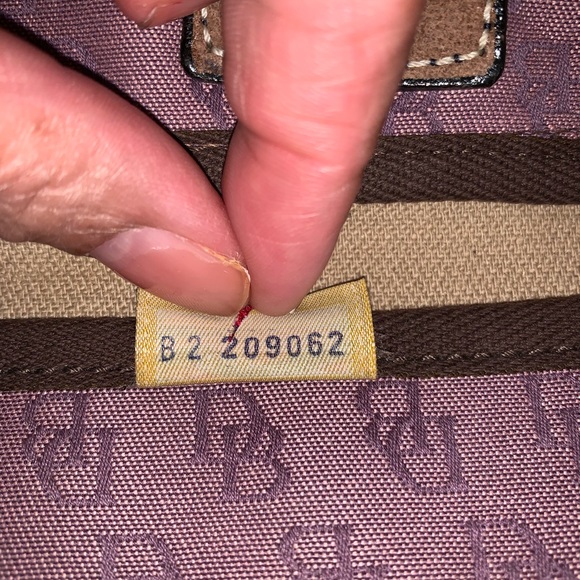 Dooney & Bourke Signature Tassel Handbag - Picture 8 of 8